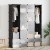 Fekete/fehér szekrény 18 tárolórekesszel 37 x 146 x 180,5 cm