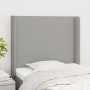 Világosszürke szövet fejtámla szárnyakkal 83x16x118/128 cm