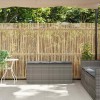 Szürke polyrattan kerti pad párnával 116 x 46 x 57 cm