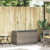 Szürke polyrattan kültéri tárolópad párnával 100 cm