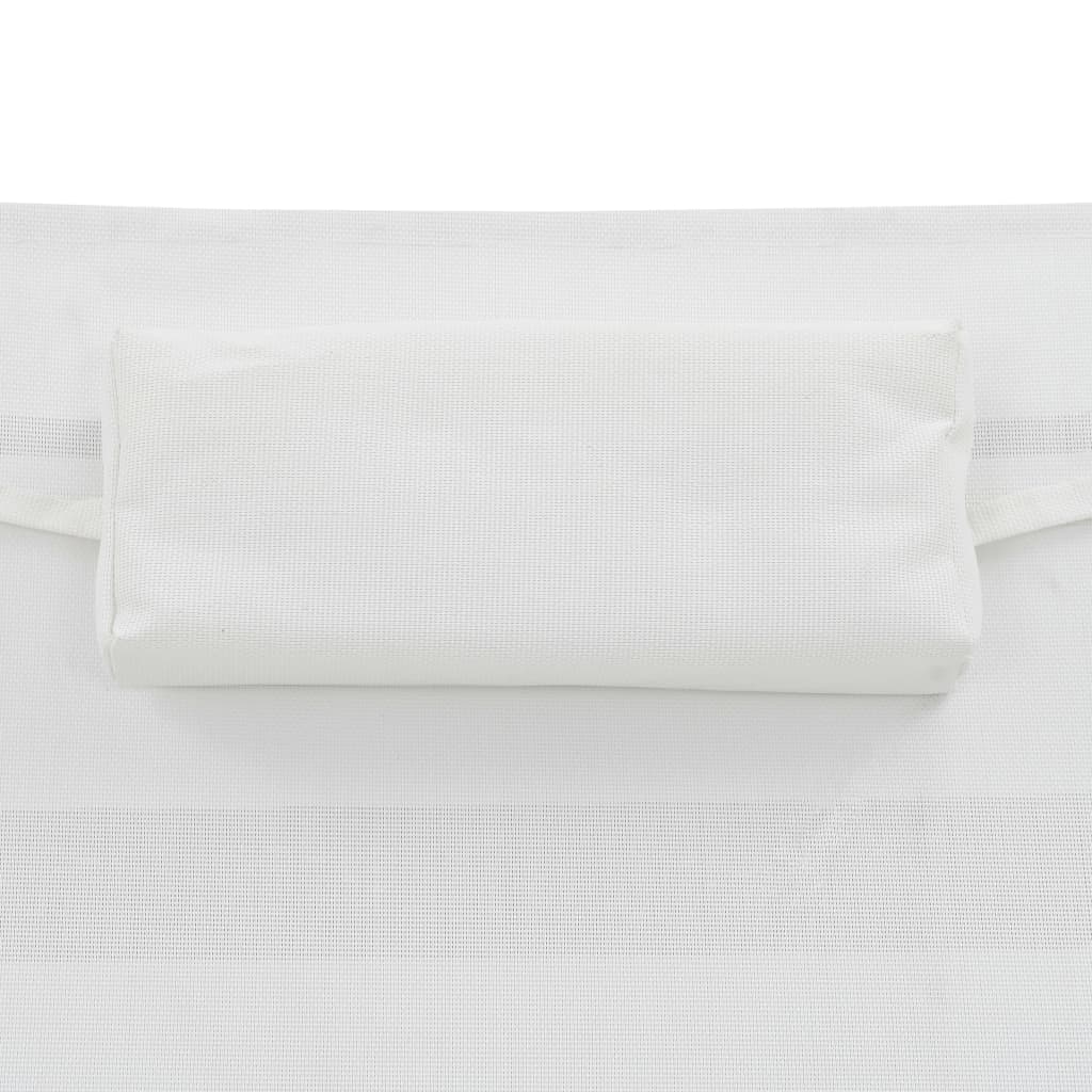 2 db fekete polyrattan és textilén napozóágy asztallal