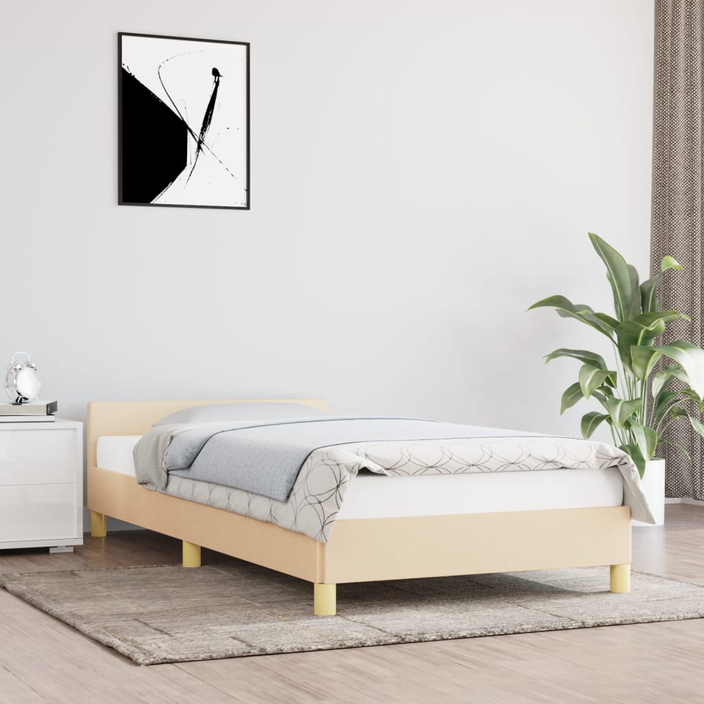 Krémszínű szövet ágykeret fejtámlával 90 x 190 cm
