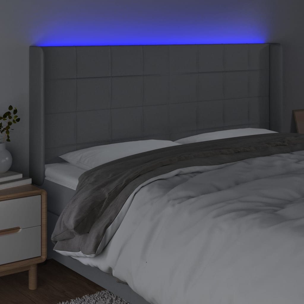 Világosszürke szövet led-es fejtámla 163x16x118/128 cm