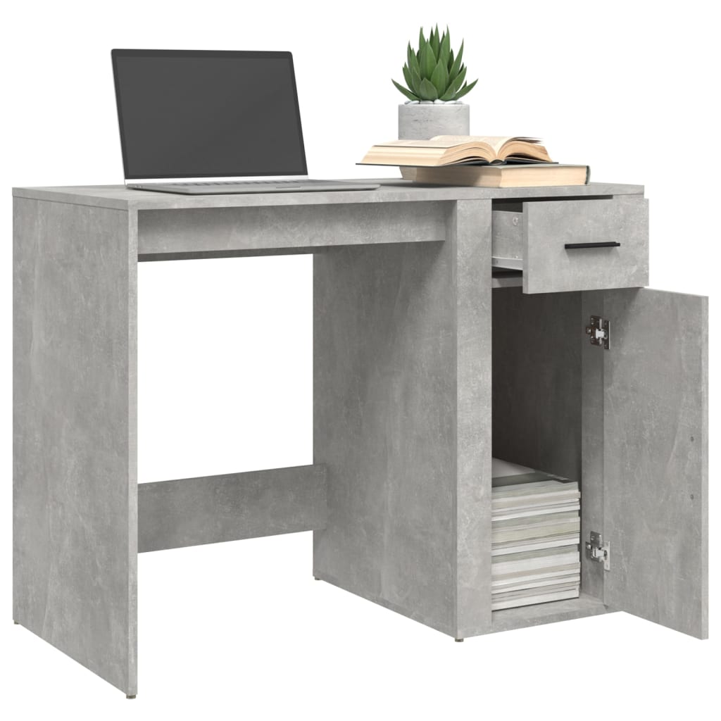 Betonszürke színű szerelt fa íróasztal 100x49x75 cm