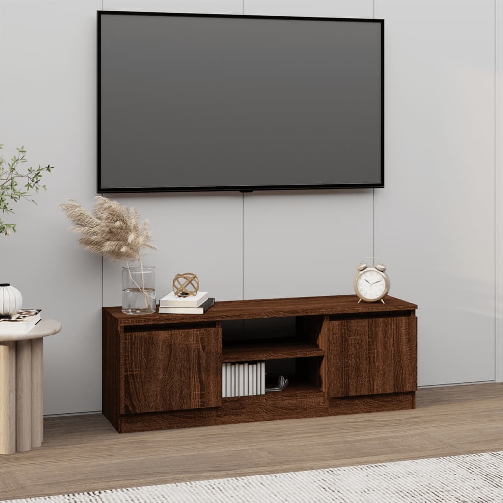 Barna tölgyszínű tv-szekrény ajtóval 102 x 30 x 36 cm Barna tölgyszínű tv-szekrény ajtóval 102 x 30 x 36 cm