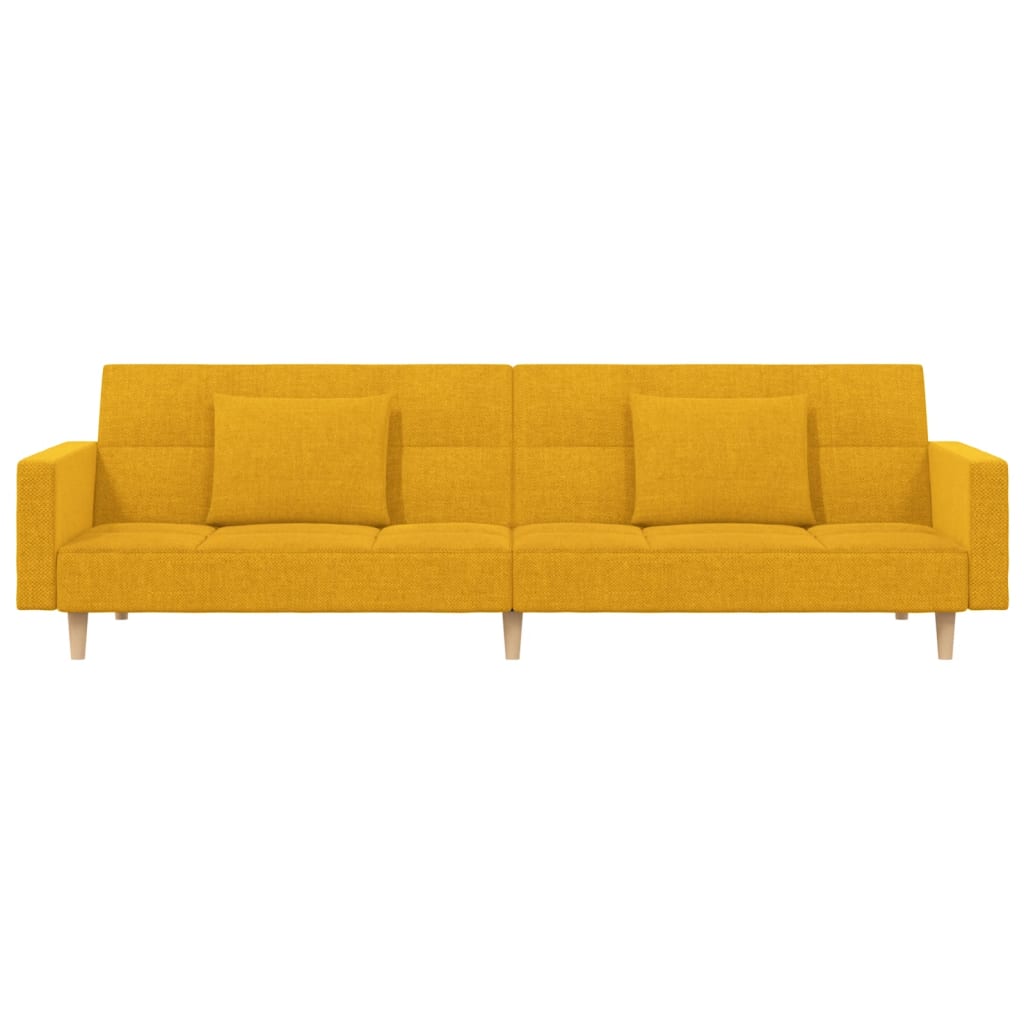 Kétszemélyes sárga szövet kanapéágy két párnával