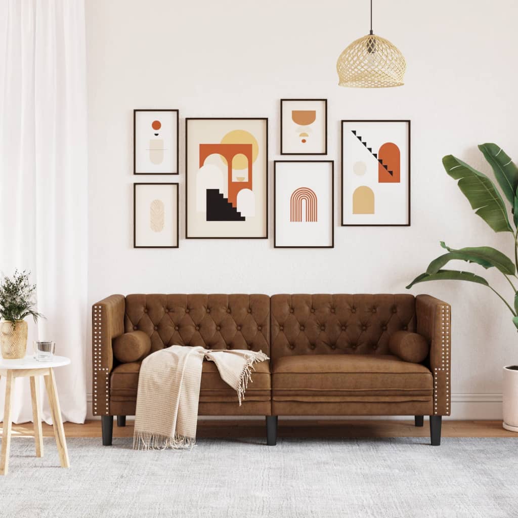 2 személyes barna műbőr chesterfield kanapé hengerpárnákkal