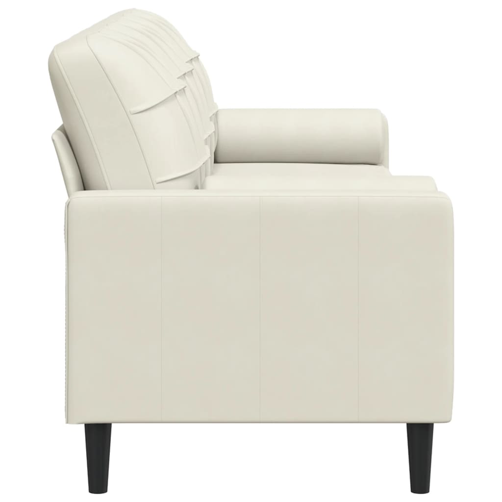 3 személyes krémszínű bársony kanapé díszpárnákkal 210 cm