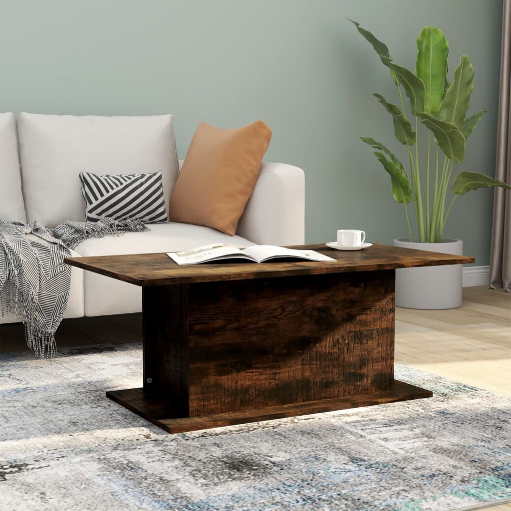 Füstös tölgyszínű forgácslap dohányzóasztal 102 x 55,5 x 40 cm